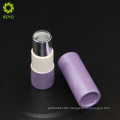 empty cosmetic container round pink violet colored paper lipstick tube